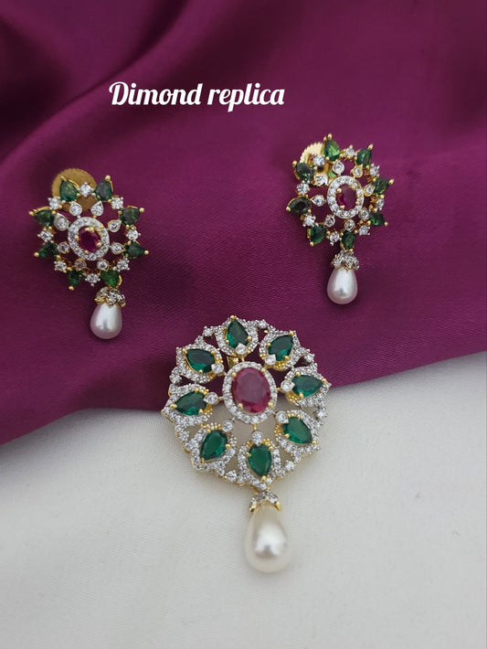 Dimond replica pendant set green stones