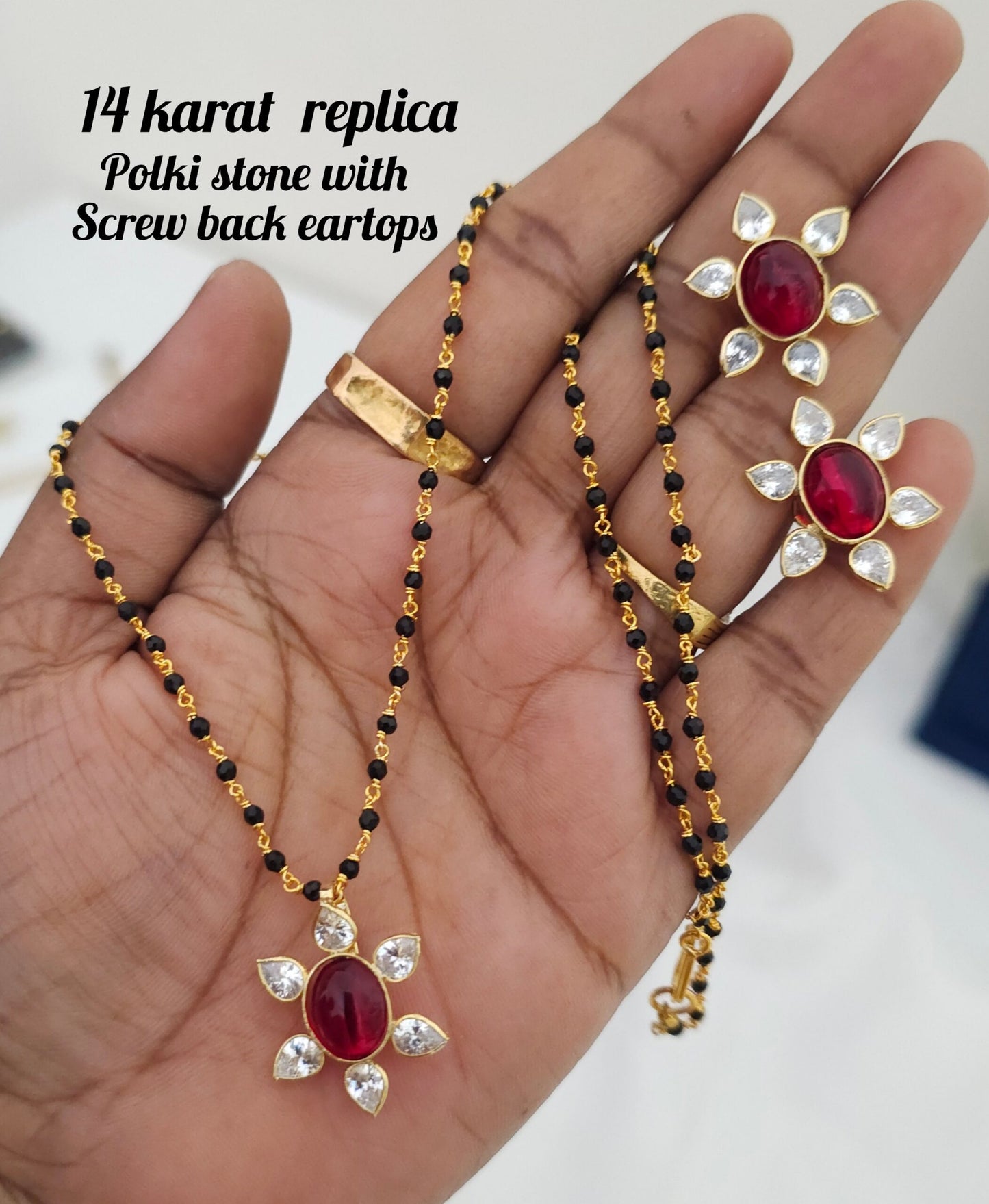 14 karat replica with pink  poliki stones screw back eartops