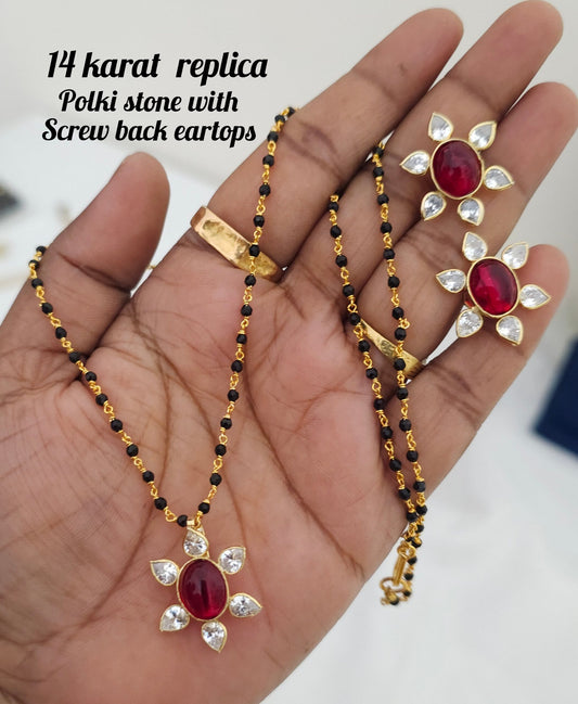 14 karat replica with pink  poliki stones screw back eartops