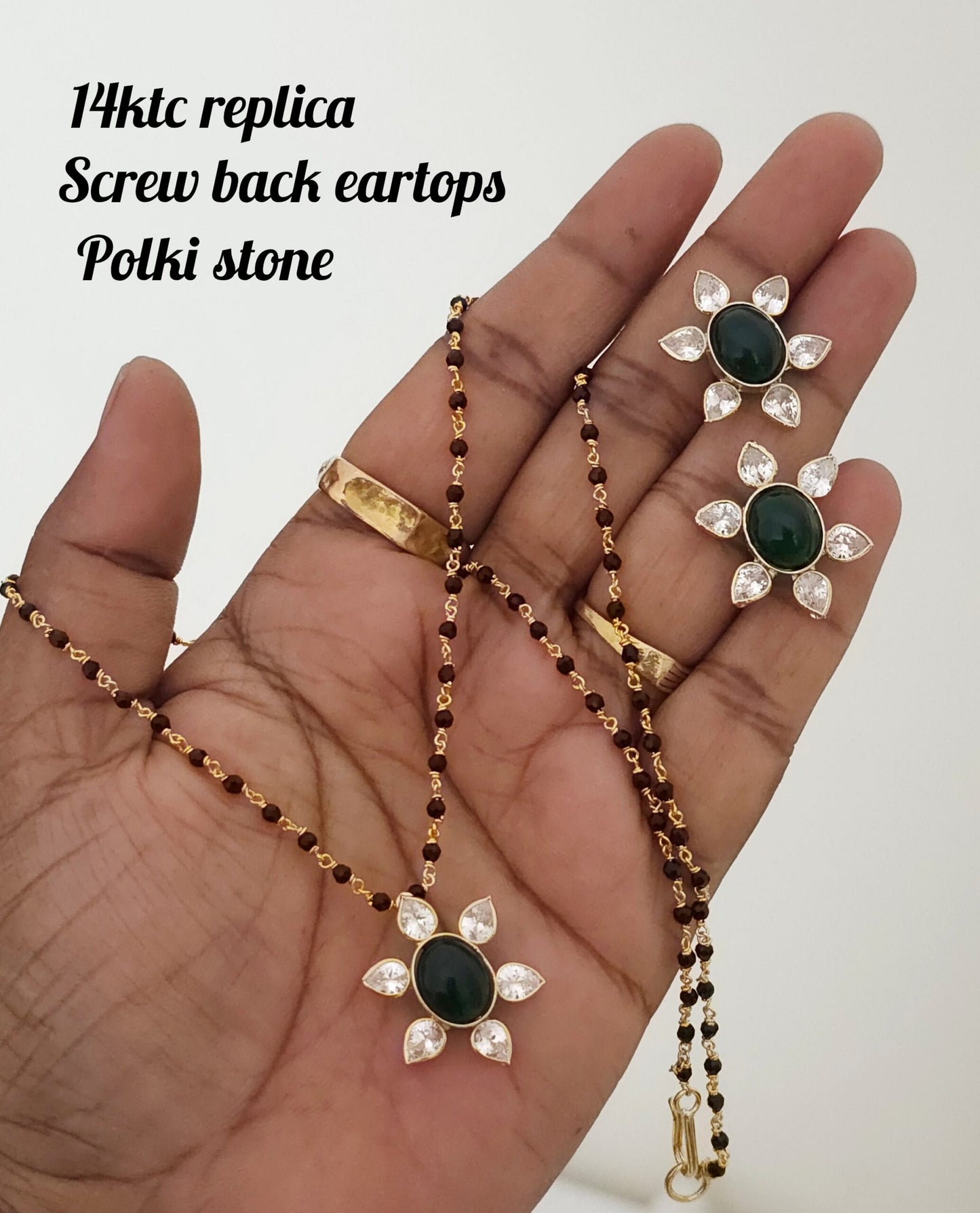 14 karat replica with green poliki stone screw back eartops