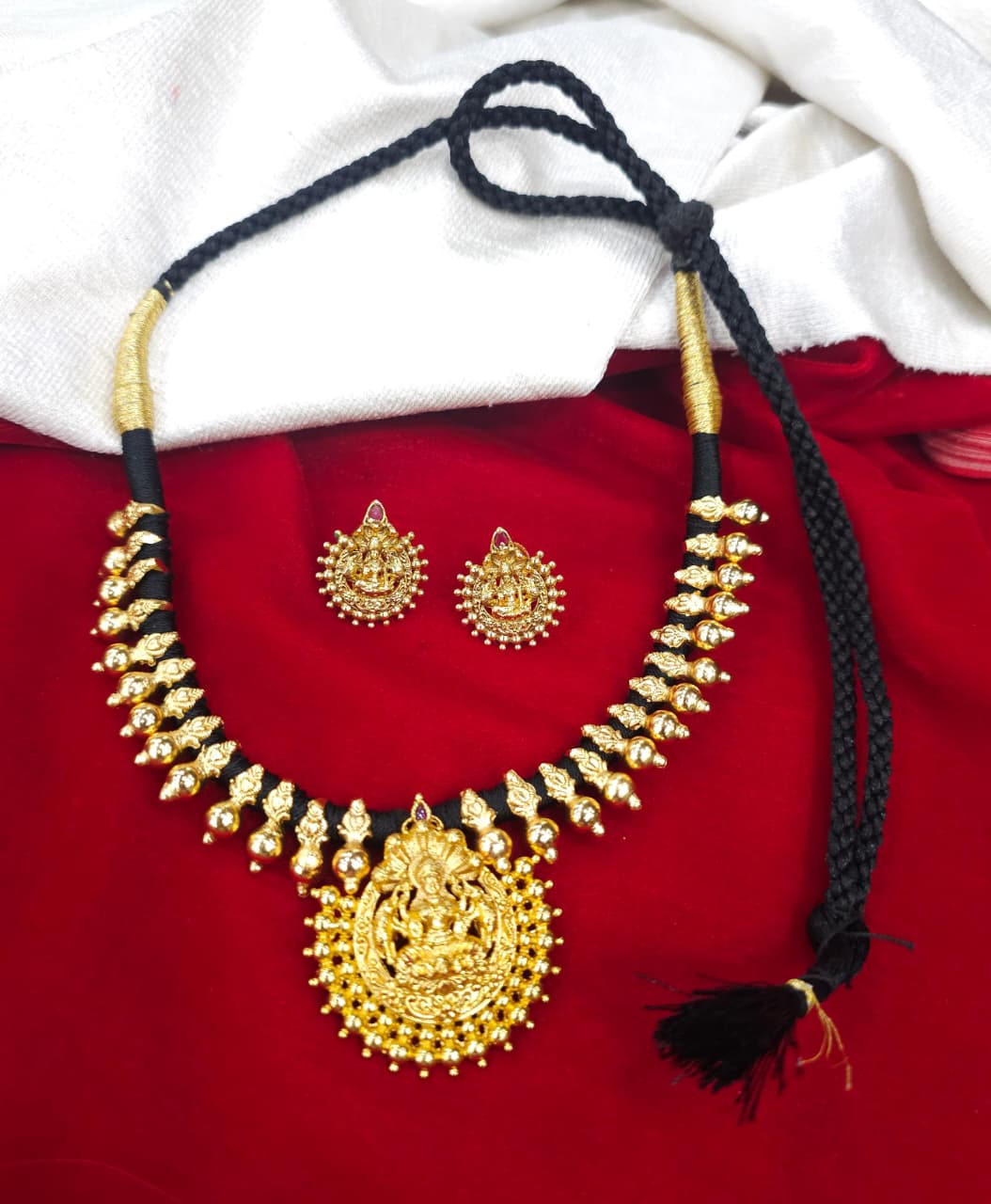Black Thread with Laxmi Dollar earrings