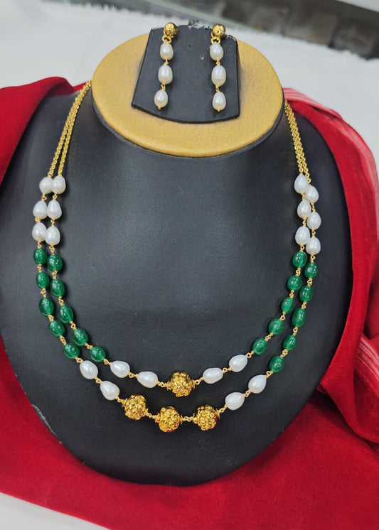 Emeralds and real pearls with Nakshi Ball with Cute Hangings
