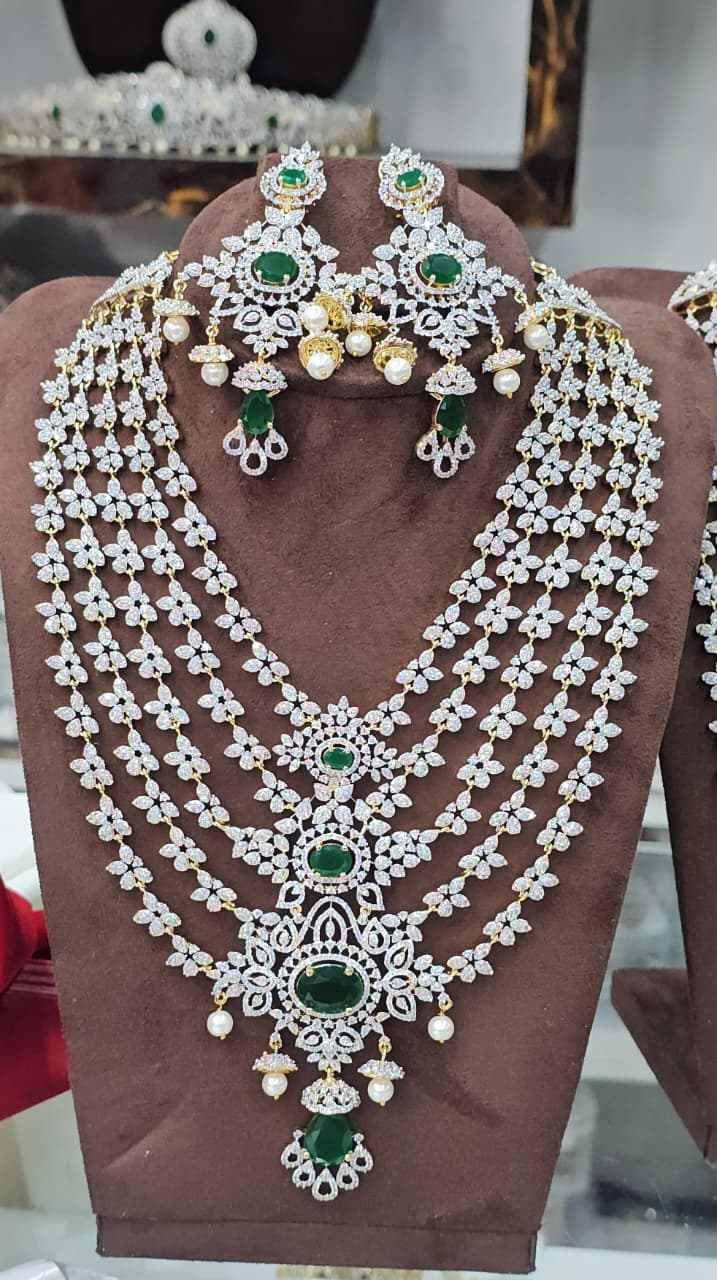 Gj heavy with Green Color stones neck set