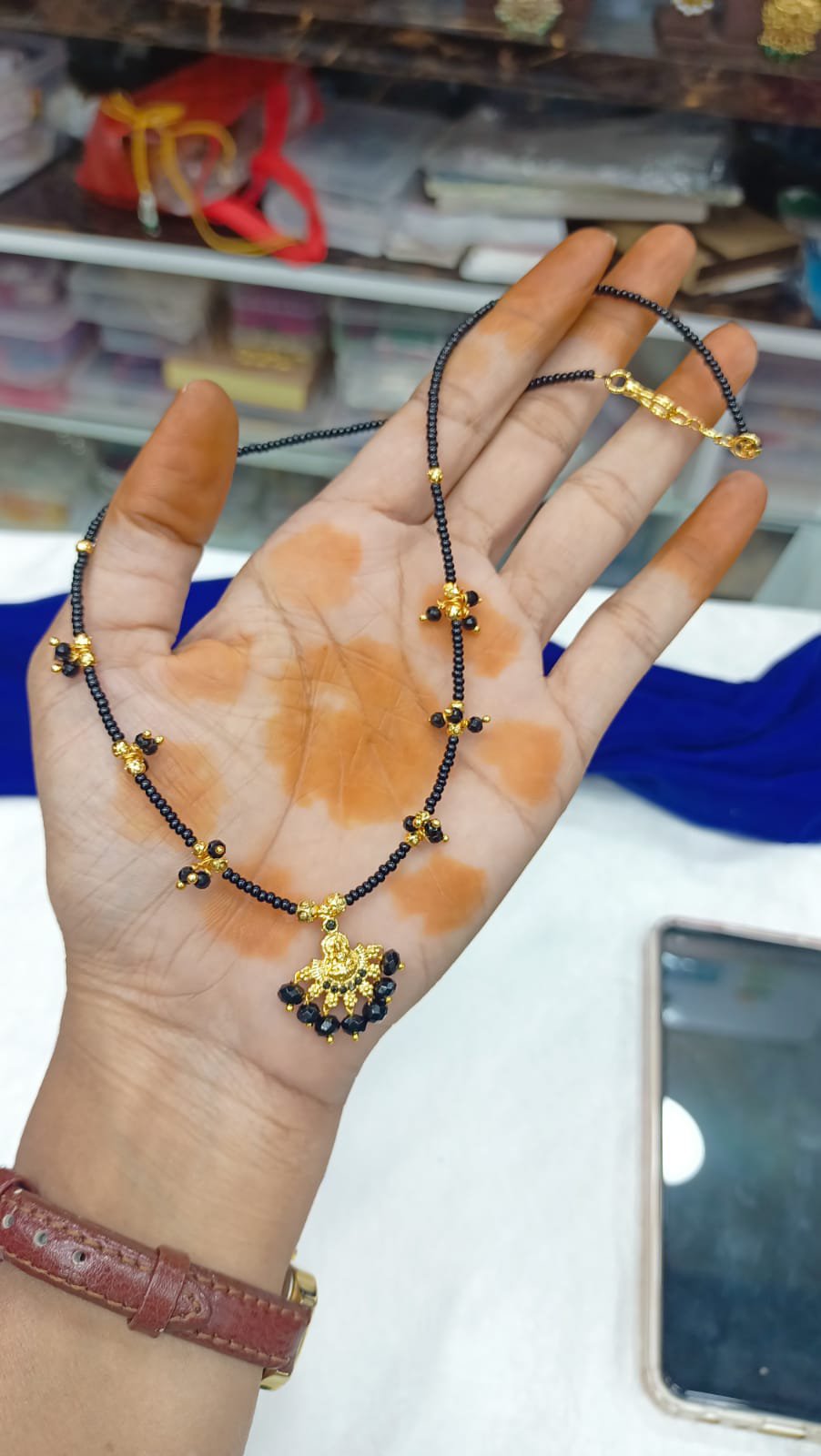 handmade mala with laxmi dolar