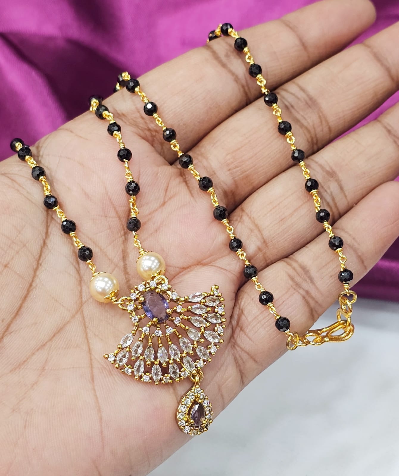 Black diamonds with locket just 700