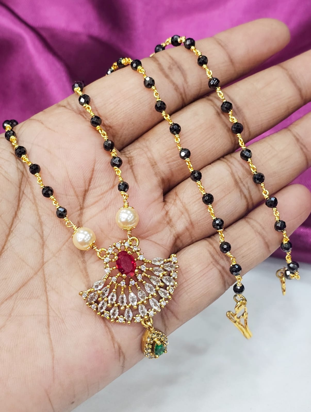 Black diamonds with  pink locket just 700