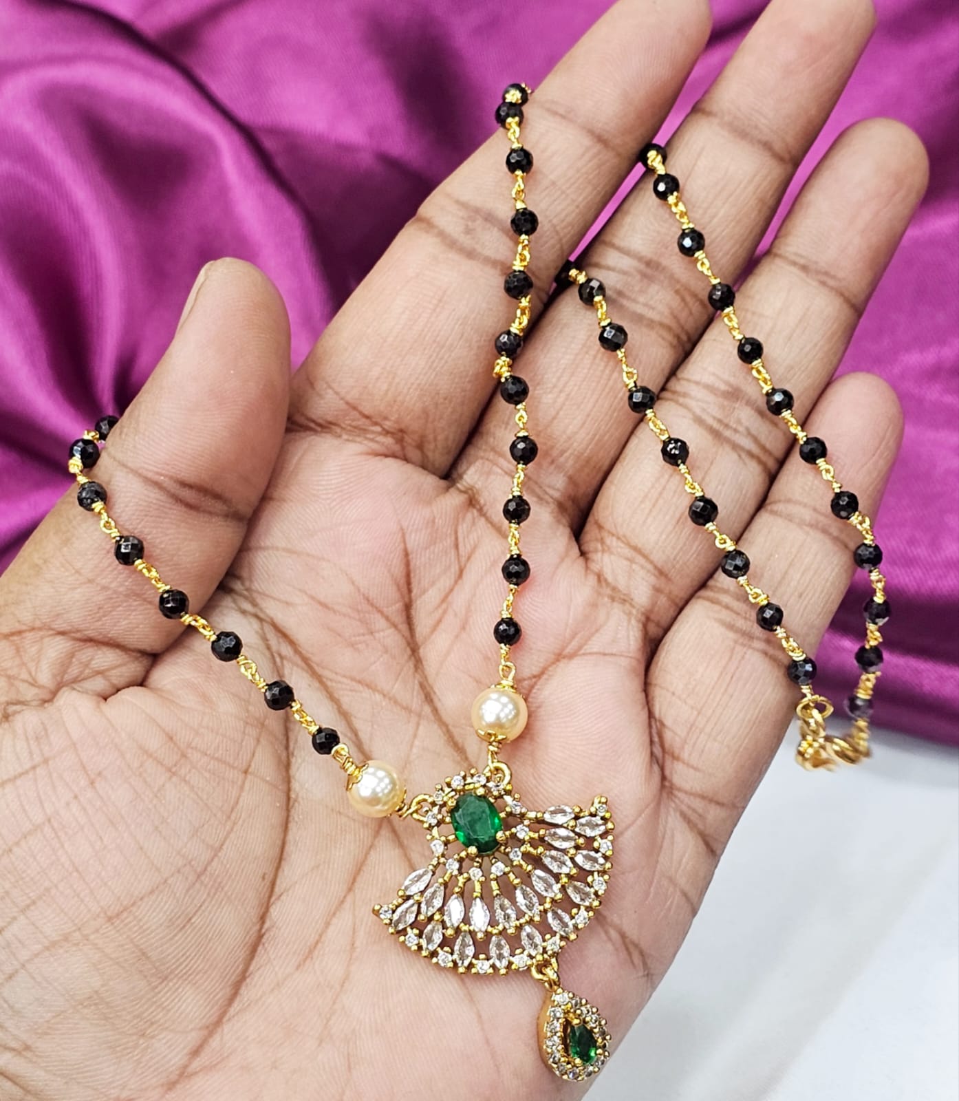 Black diamonds with green locket just 700