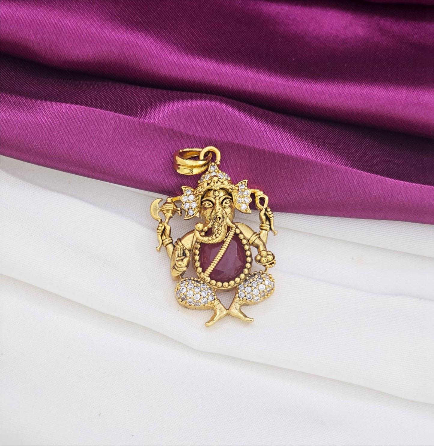Ganapati locketwith pink stone just 350