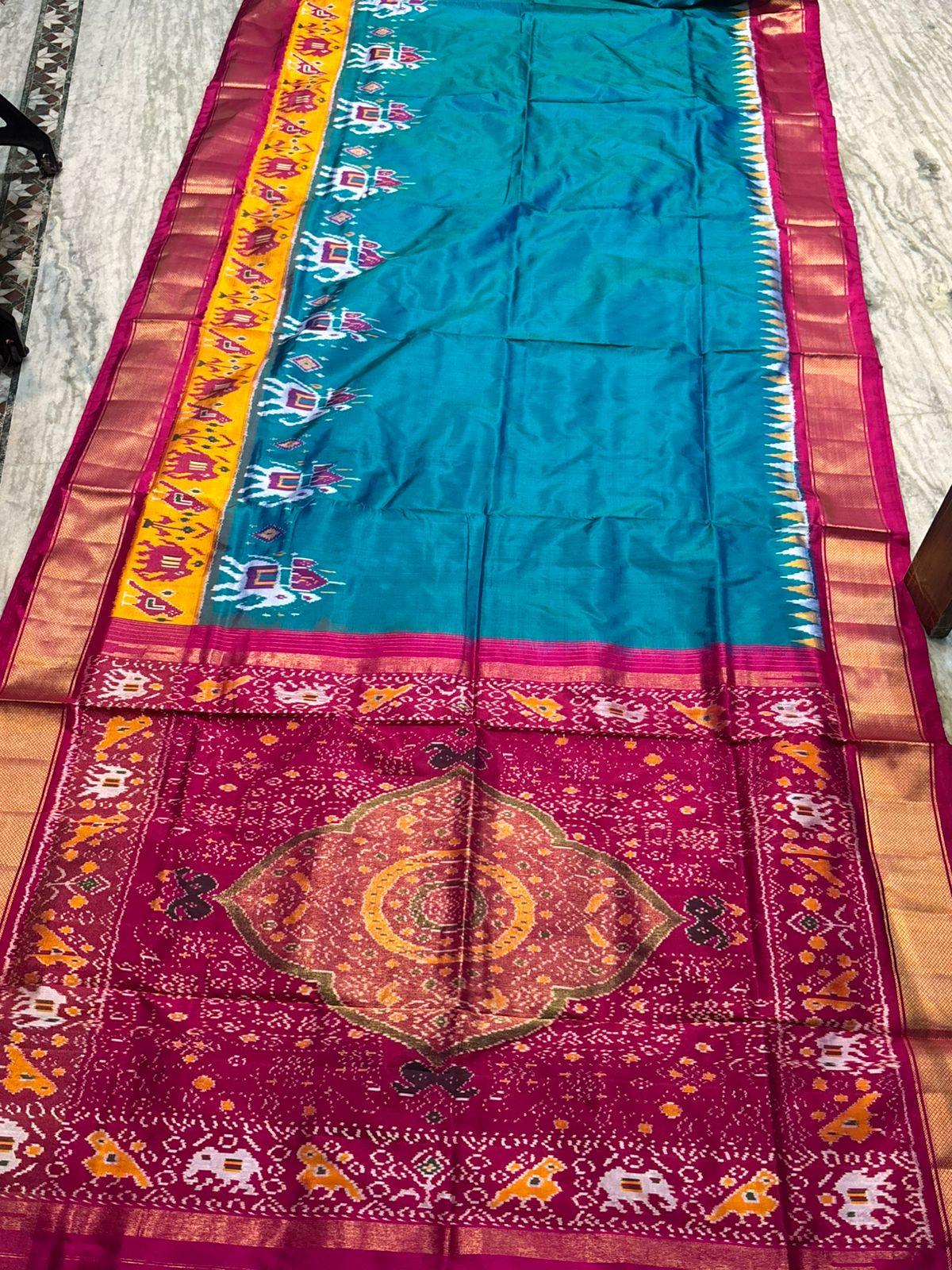 Pure Pochampally Ikkat Silk Saree in Teal & Magenta | Elephant Motif Border | Traditional Handloom Pattu Saree - pochampallysarees.com