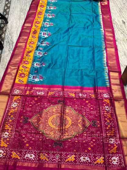 Pure Pochampally Ikkat Silk Saree in Teal & Magenta | Elephant Motif Border | Traditional Handloom Pattu Saree - pochampallysarees.com