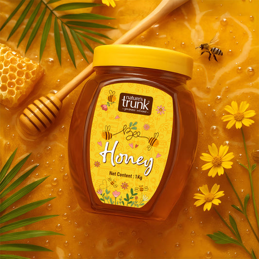 Jar of nature’s trunk bee honey with dipper, flowers and bees – natural honey online, buy natural honey online