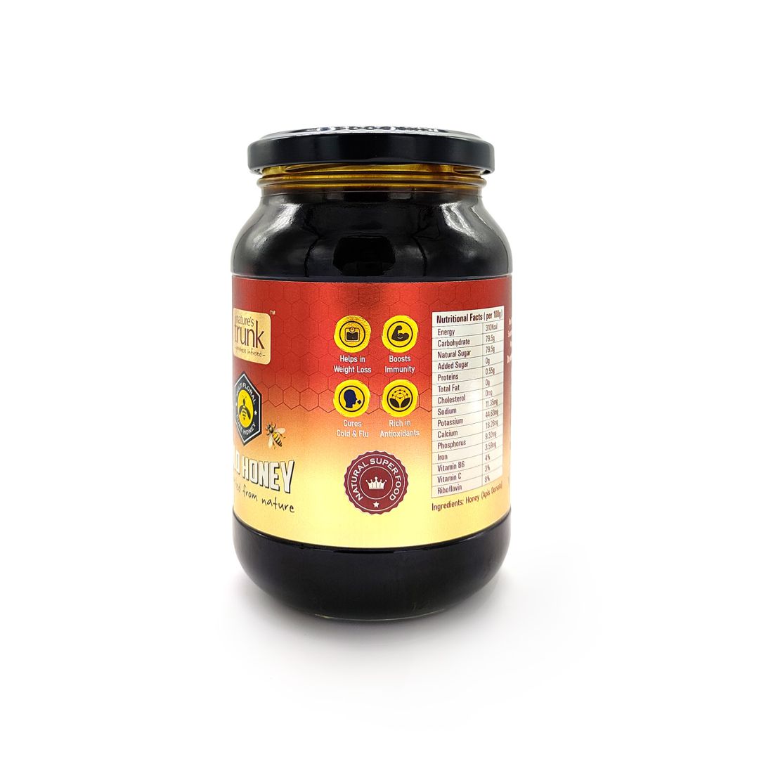Close-up of wild forest honey in a jar with rich golden texture, pure organic sweetness for healthy use
