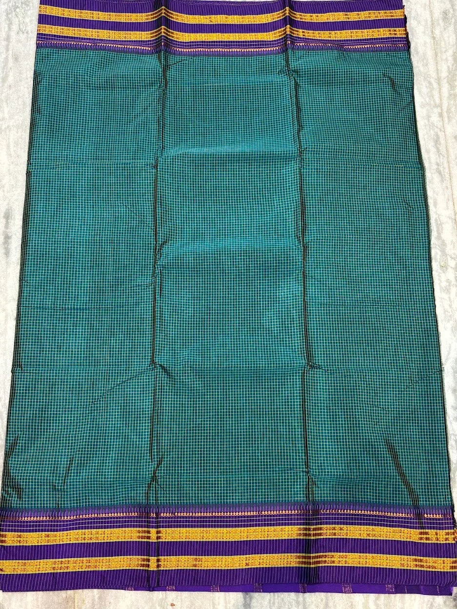 Pure Gadwal Silk Saree in Teal Green with Contrast Purple Zari Border - pochampallysarees.com
