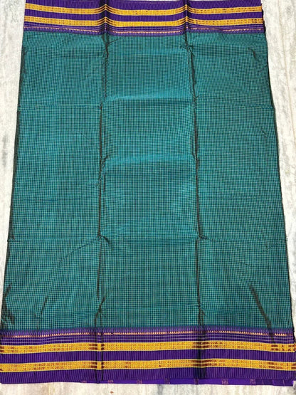 Pure Gadwal Silk Saree in Teal Green with Contrast Purple Zari Border - pochampallysarees.com