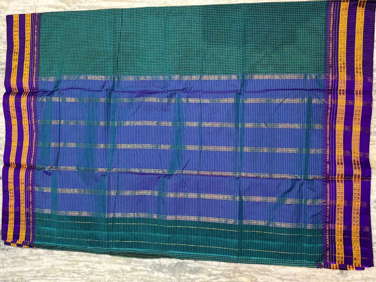 Pure Gadwal Silk Saree in Teal Green with Contrast Purple Zari Border - pochampallysarees.com