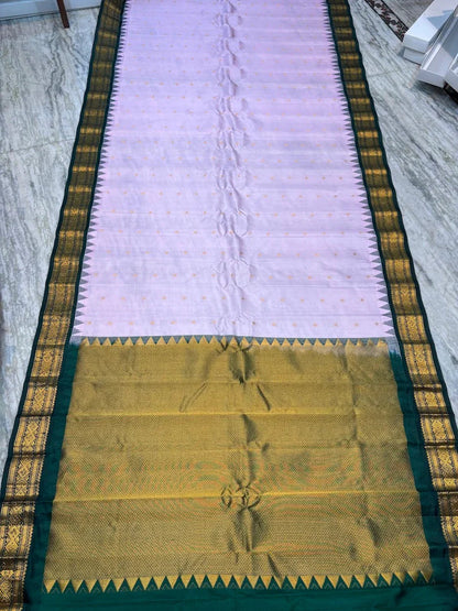 Pure Gadwal Silk Saree in Pastel Pink & Bottle Green with Rich Gold Zari Temple Border | Traditional Handloom Pattu Saree for Weddings & Festivals - pochampallysarees.com