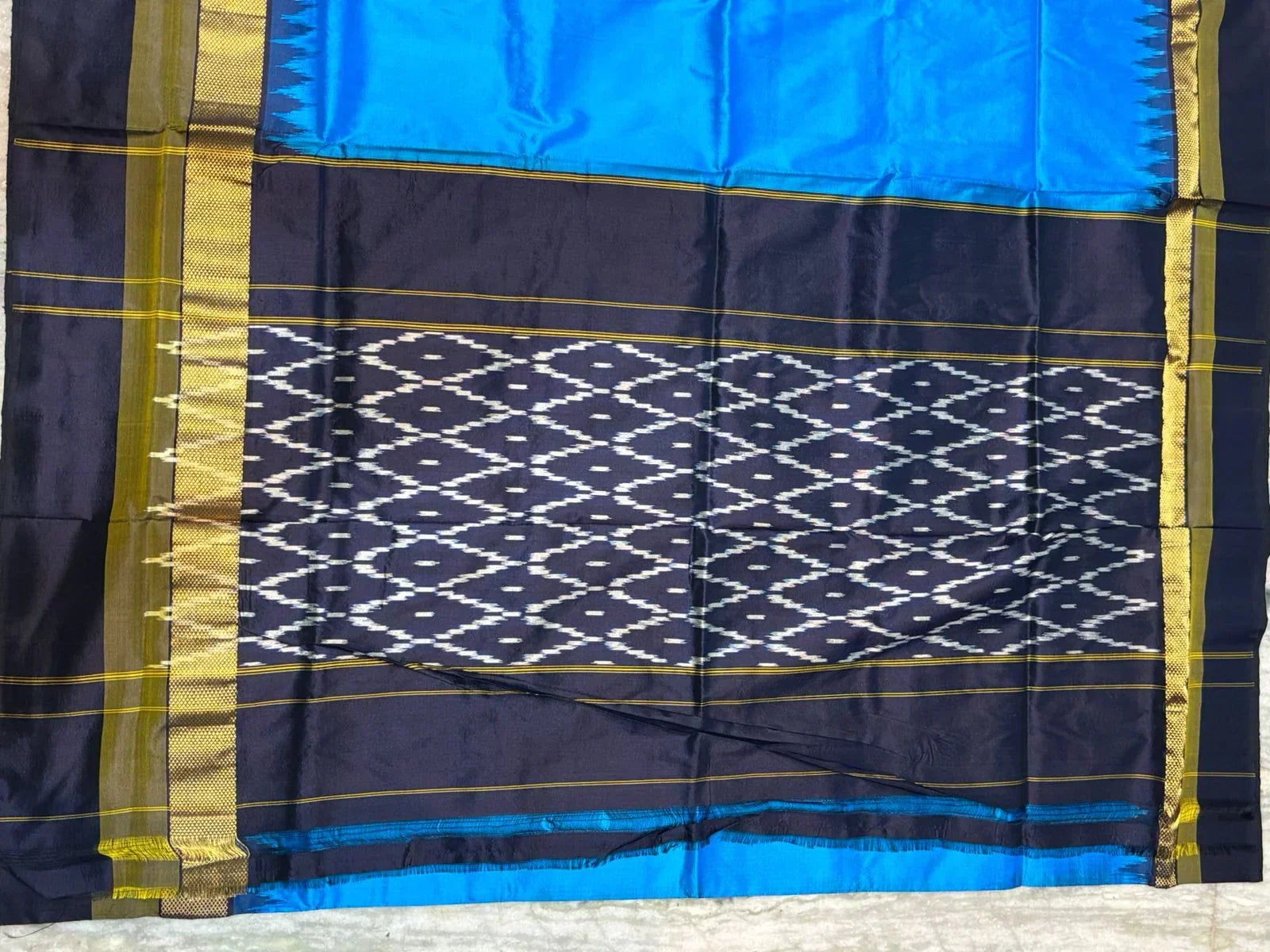 Pure Ikkat Silk Saree in Radiant Blue with Contrast Black Temple Border & Geometric Pallu - pochampallysarees.com