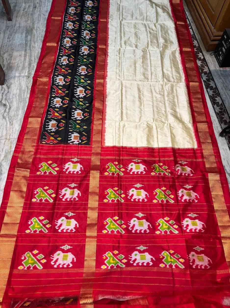 Traditional Cream & Red Ikkat Silk Saree with Black Elephant Motif Border | Pochampally Handloom - pochampallysarees.com
