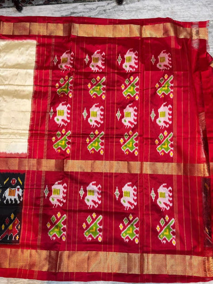 Traditional Cream & Red Ikkat Silk Saree with Black Elephant Motif Border | Pochampally Handloom - pochampallysarees.com