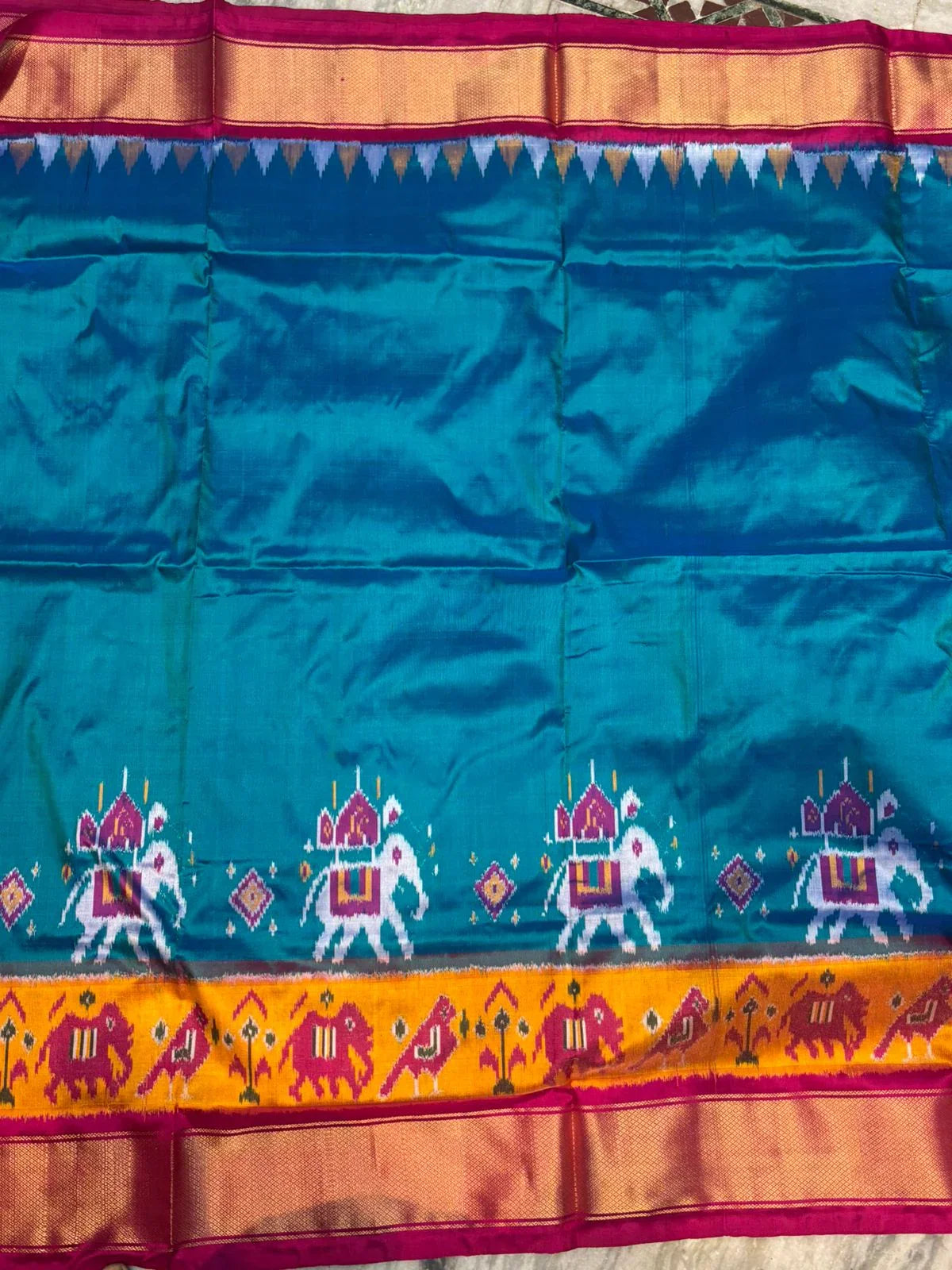Pure Pochampally Ikkat Silk Saree in Teal & Magenta | Elephant Motif Border | Traditional Handloom Pattu Saree - pochampallysarees.com