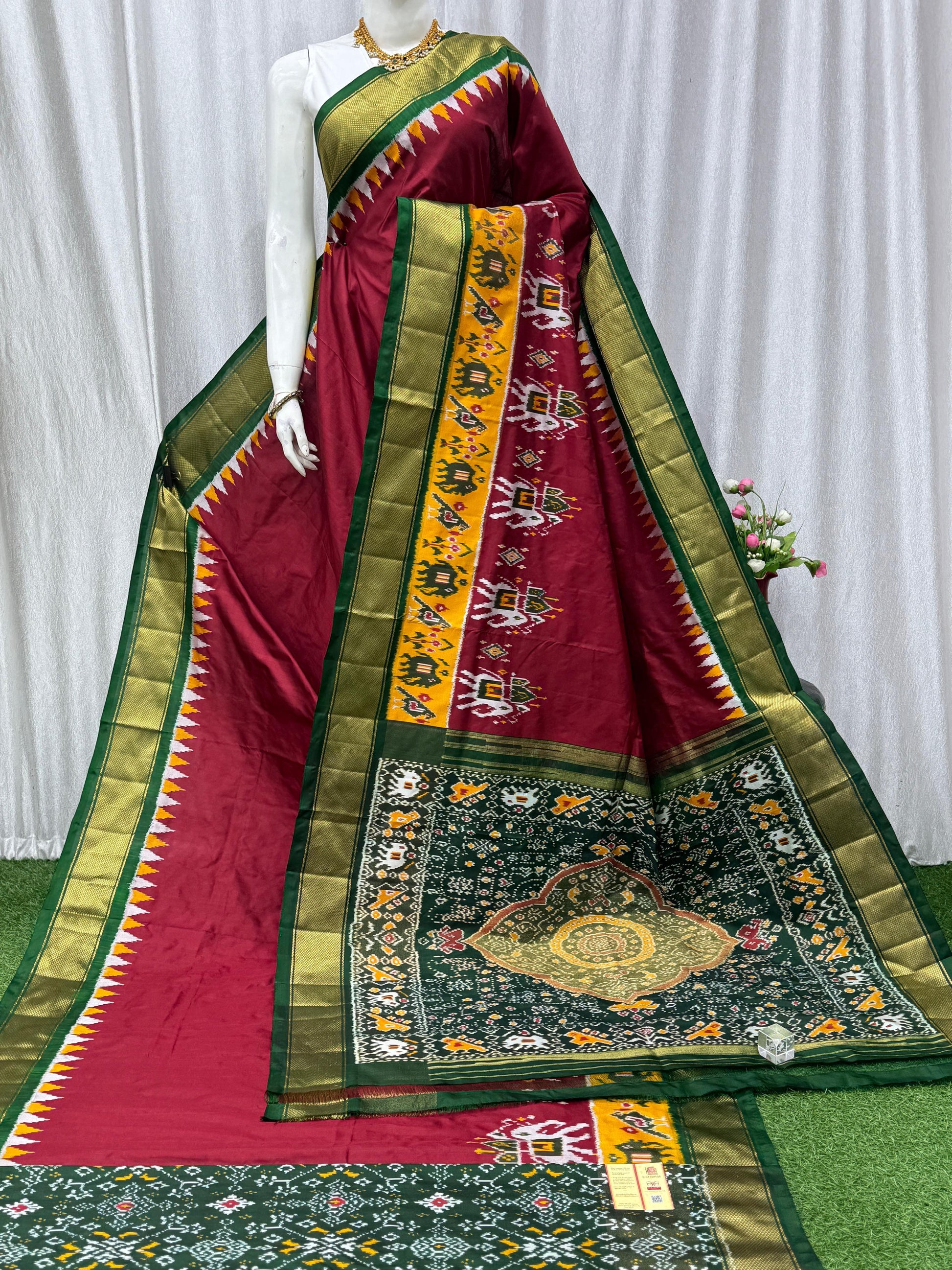 Pure Pochampally Ikkat Silk Saree in Maroon & Green with Intricate Elephant Motifs and Zari Border - pochampallysarees.com