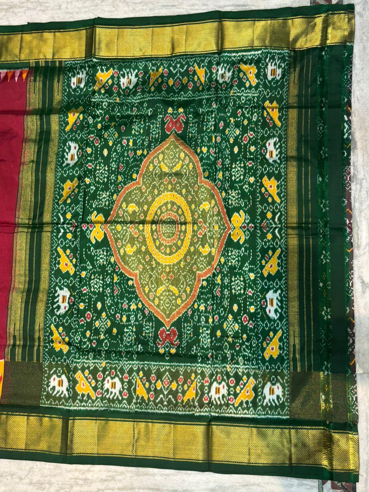 Pure Pochampally Ikkat Silk Saree in Maroon & Green with Intricate Elephant Motifs and Zari Border - pochampallysarees.com