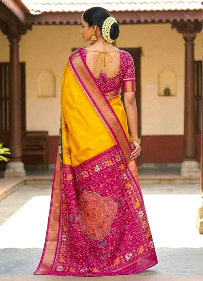 POCHAMPALLY IKKAT SILK BODY MANGO YELLOW BORDER PINK AND PALLU AND BLOUSE IKKAT DESIGN PINK SARI - pochampallysarees.com