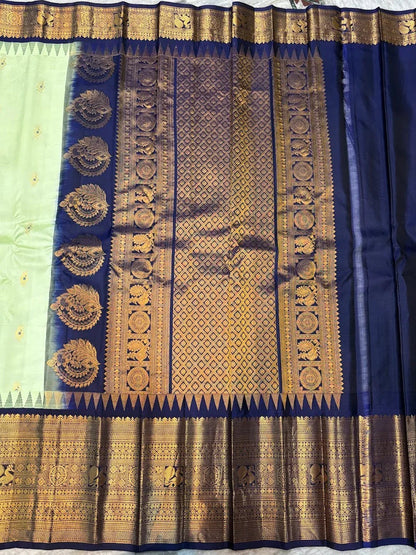 Pure Gadwal Silk Saree in Pastel Mint Green with Navy Blue Temple Border & Grand Gold Zari Pallu | Traditional Handloom Wedding Saree - pochampallysarees.com
