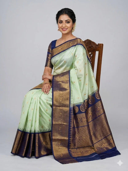 Pure Gadwal Silk Saree in Pastel Mint Green with Navy Blue Temple Border & Grand Gold Zari Pallu | Traditional Handloom Wedding Saree - pochampallysarees.com